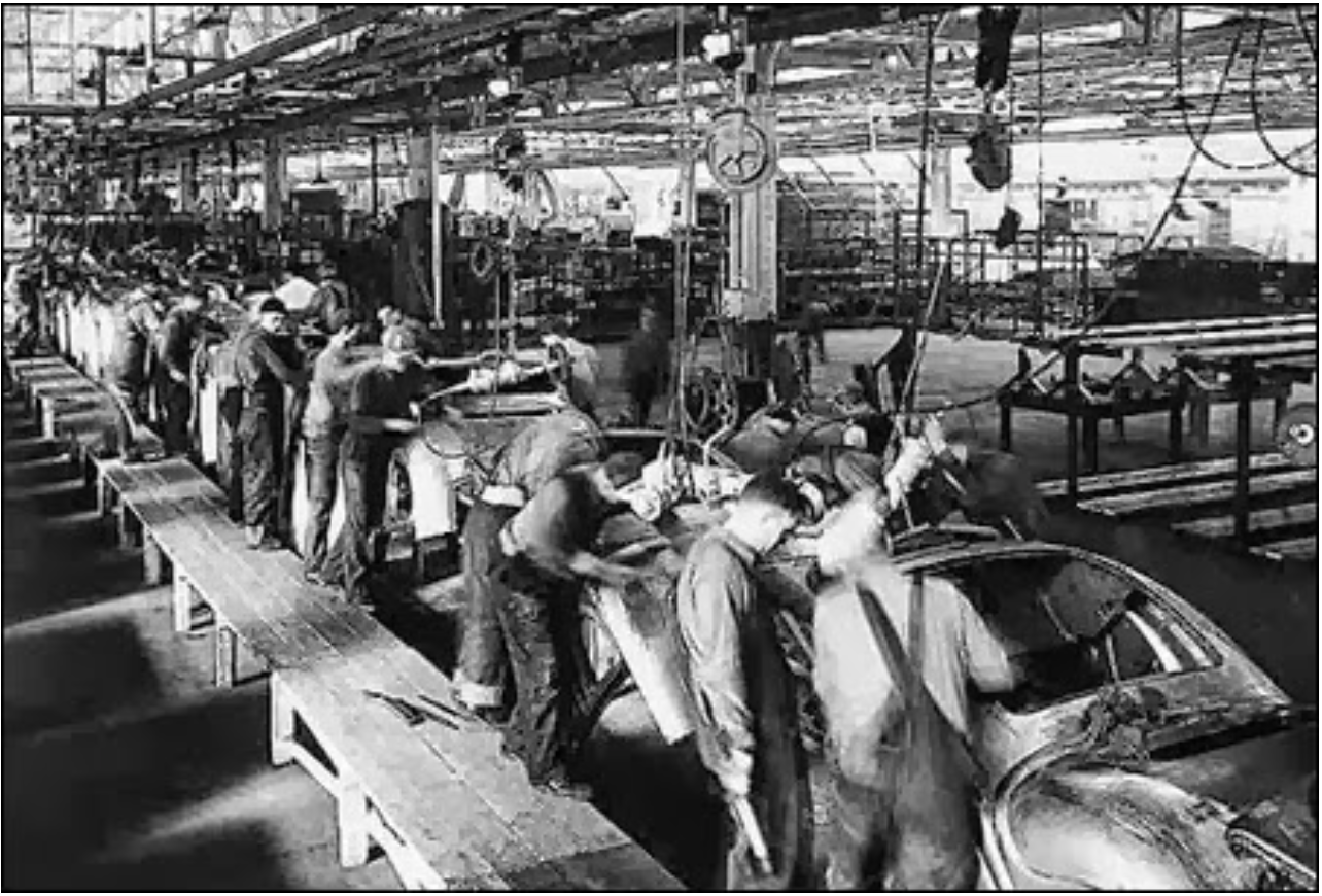 An auto assembly line, circa 1913